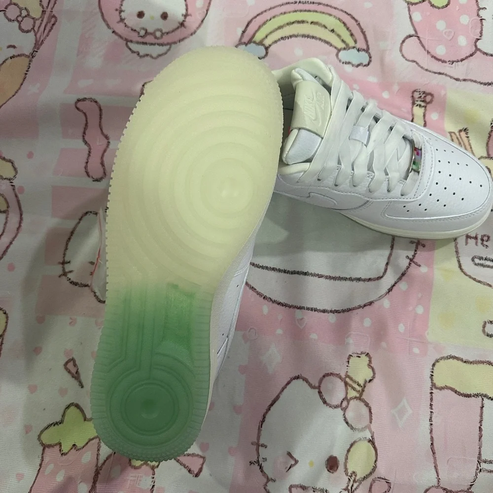 Nike Men’s White Sneakers with Pink Heel Accent